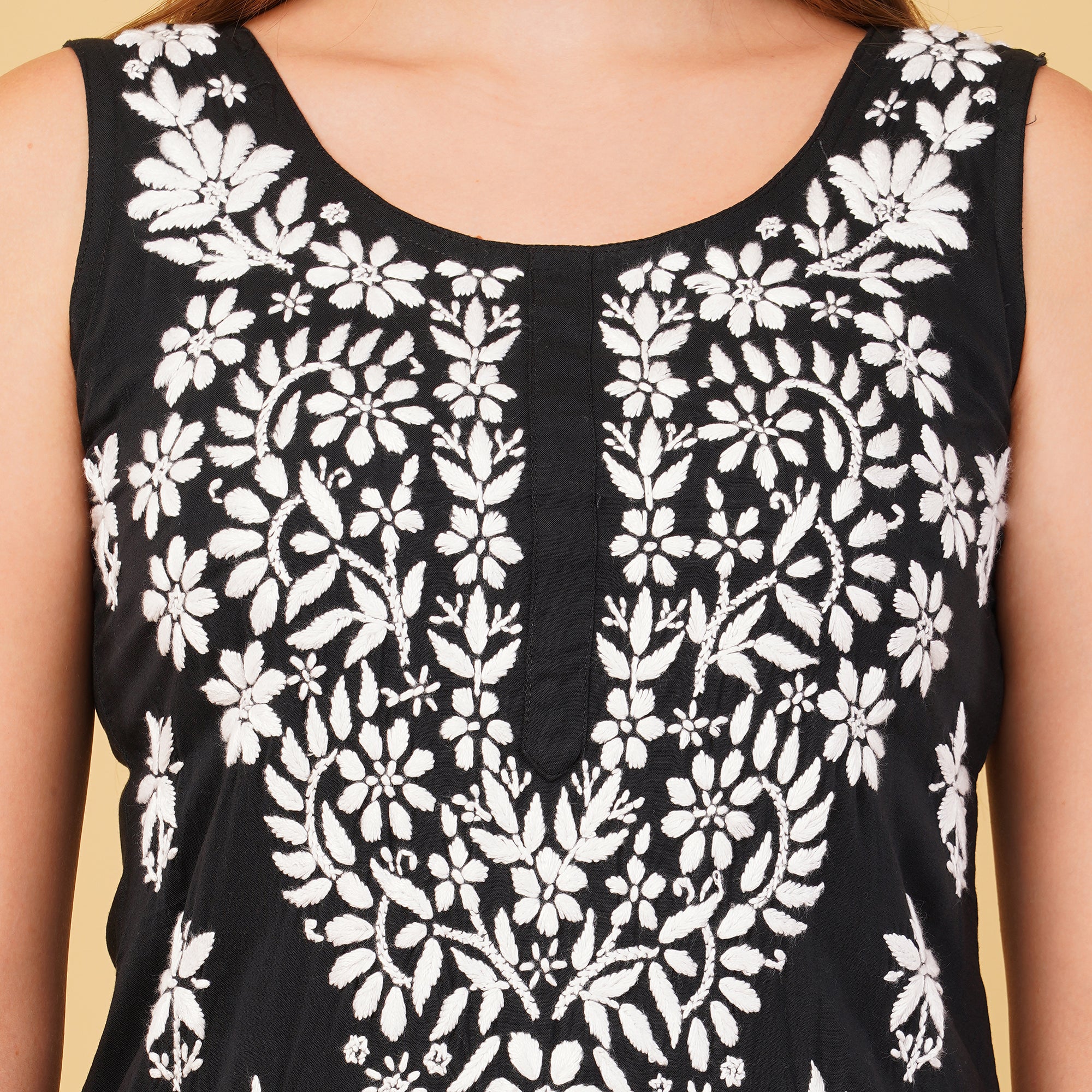 SLEEVELESS CHIKANKARI KURTA